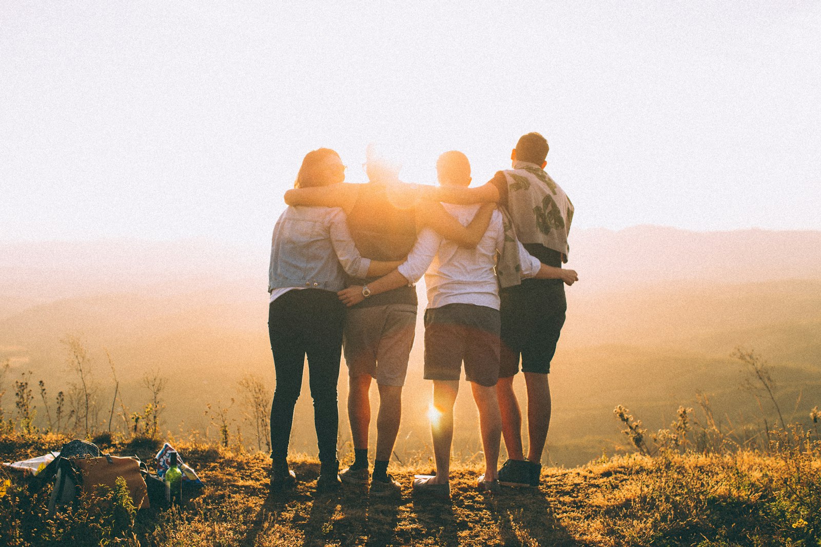 People together at sunset, enjoying shared entertainment